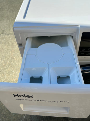 Factory second Haier HWD8040BW1 8kg/4kg Front Load Washer & Dryer Combo - Second Hand Appliances Geebung